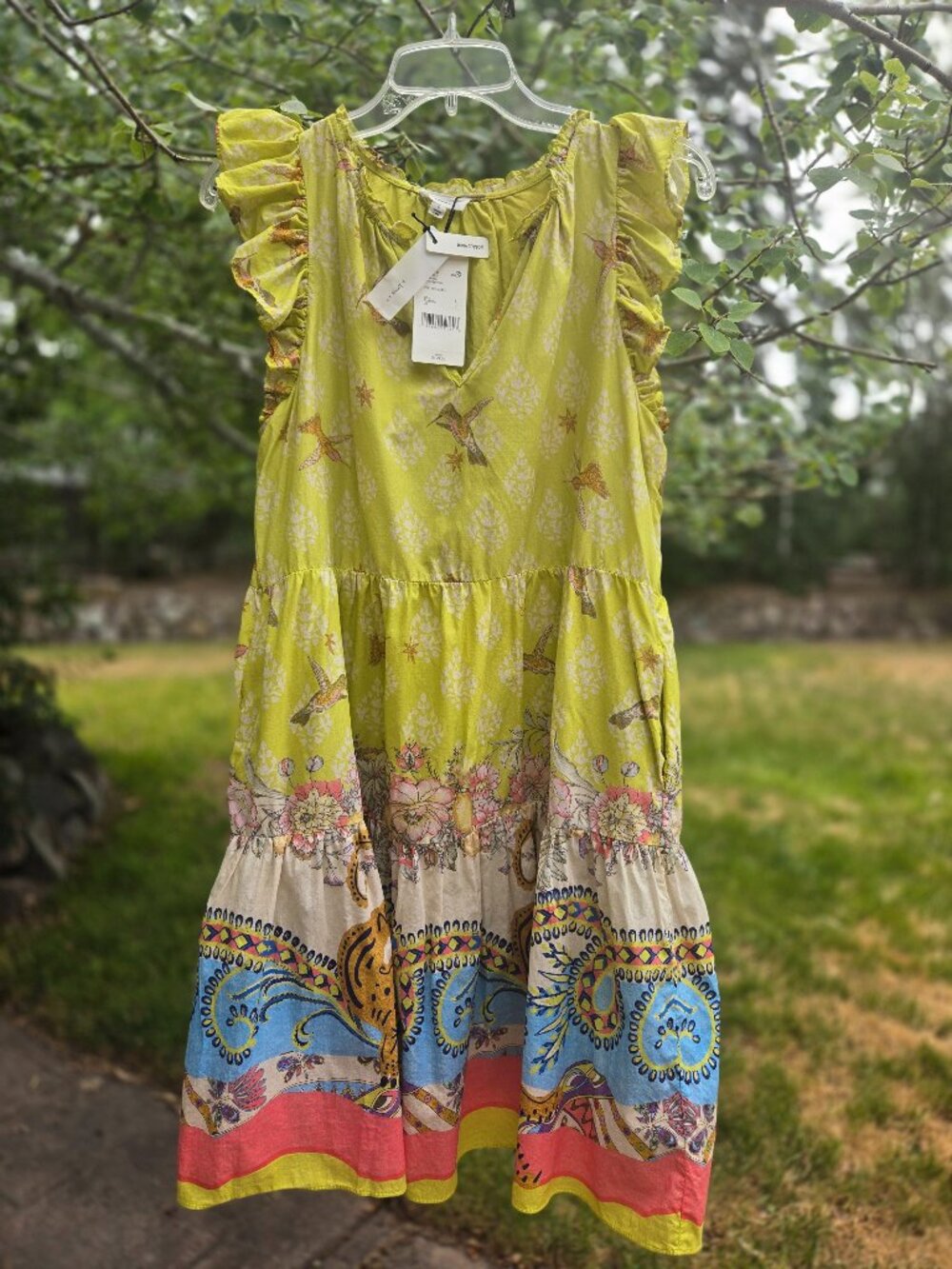A Loves A Flutter Sleeve Tiered Mini Dress in pistachio green